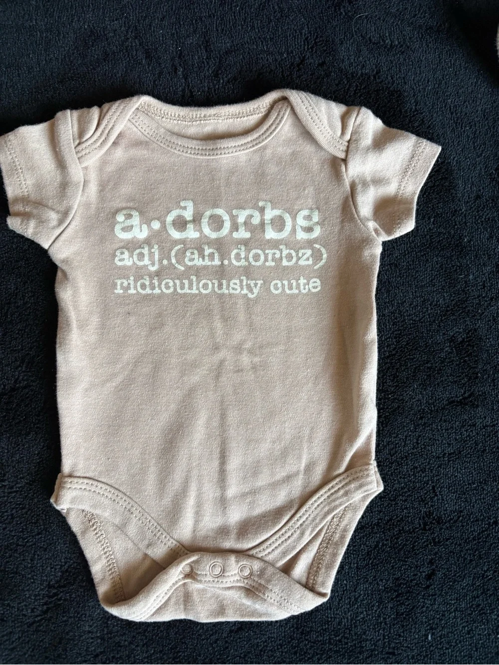 Ridiculously Cute 'a.dorbs' Baby One-Piece in Light Beige